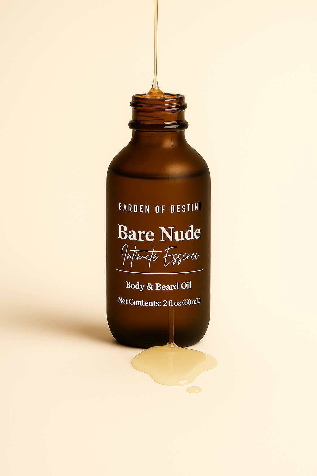 A 2oz amber glass bottle of Garden of Destini Bare Nude Intimate Essence Body & Beard Oil sits on a light beige surface with golden oil elegantly dripping into and around the bottle. The warm lighting and minimalist background create a luxurious, sensual, and clean aesthetic.